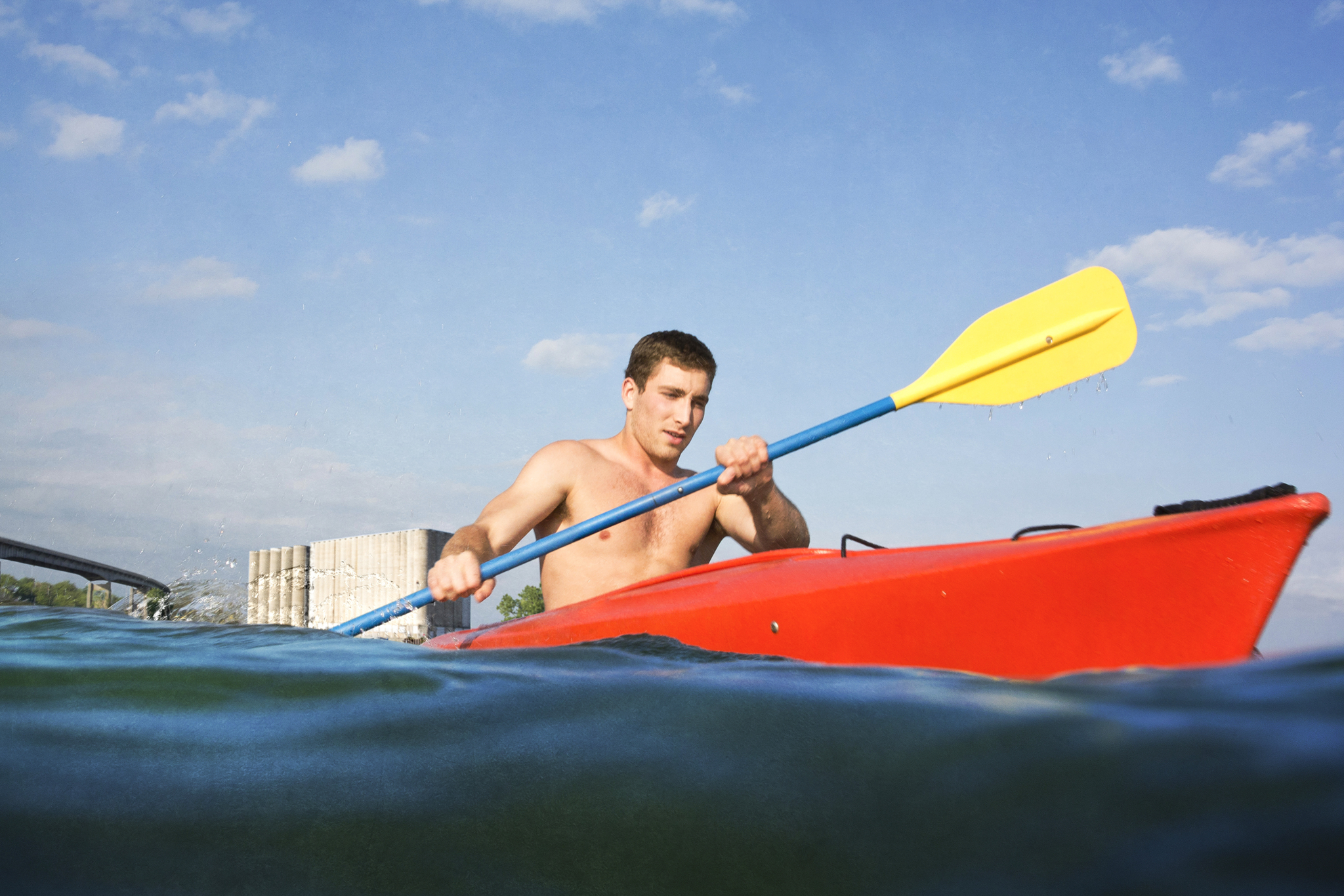 Man Paddling in Kayak